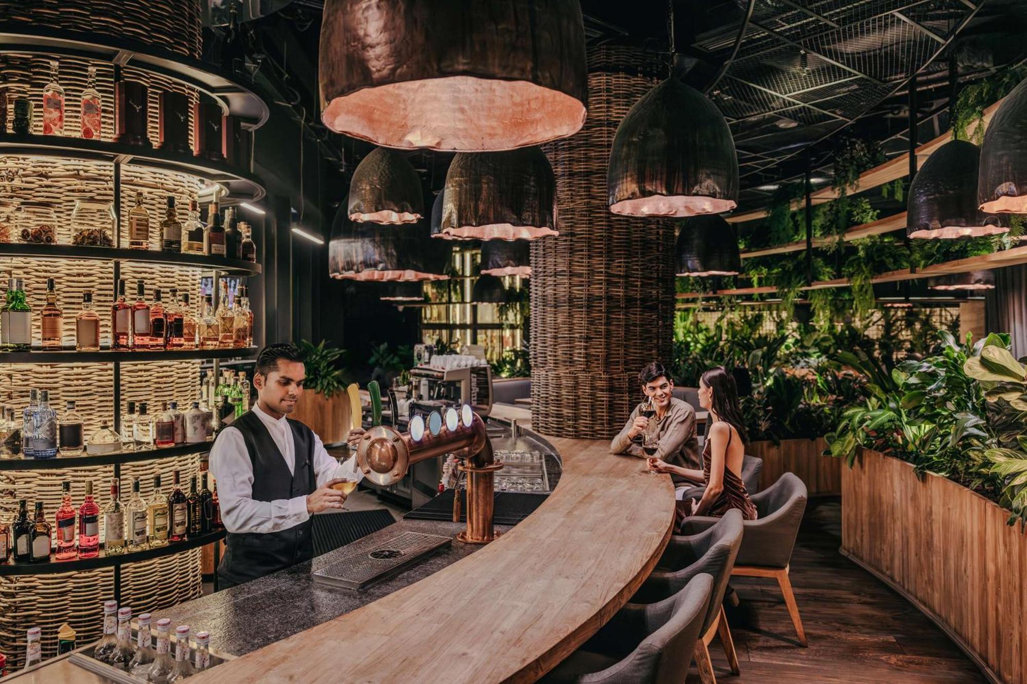 Dusit Thani Laguna Singapura Exterior foto The interior of a typical Starbucks Reserve store